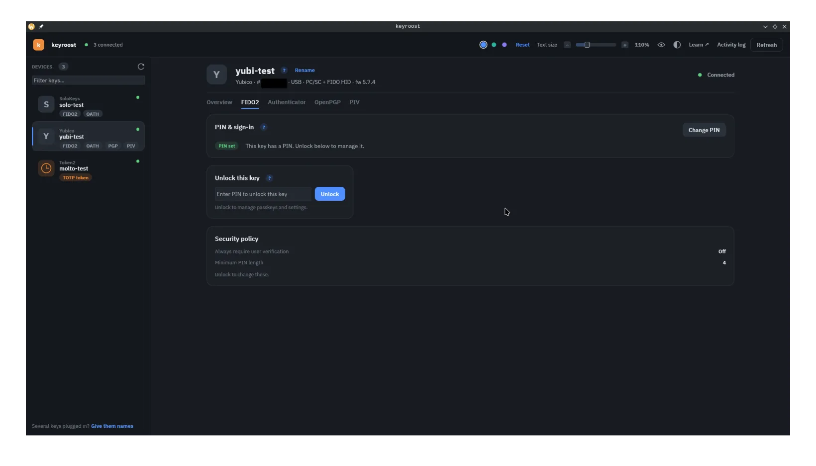 keyroost screenshot — The FIDO2 tab: PIN state, unlock, and CTAP 2.1 security policy.